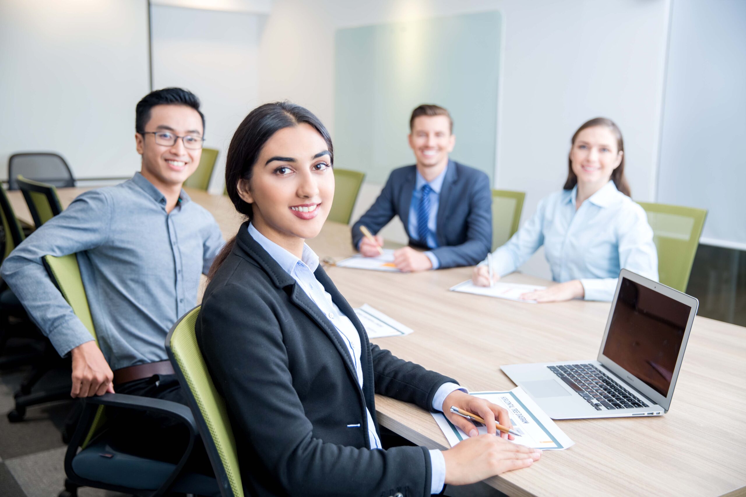 HR representatives positively greeting female job candidate